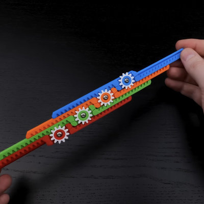 Mathematician Henry Segerman creates expanding mechanisms for 3D printing and mechanical designs using rack-and-pinion arrangements, offering free downloads and resources for enthusiasts.