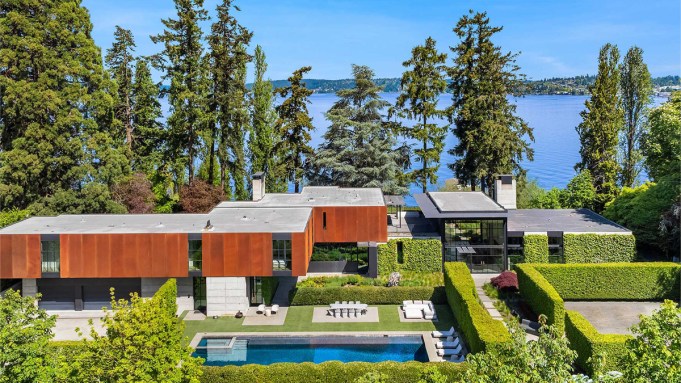A $79 MILLION WATERFRONT HOME by Tom Kundig features modern design, luxurious amenities like a wine collection, private dock, infinity pool, and gym.