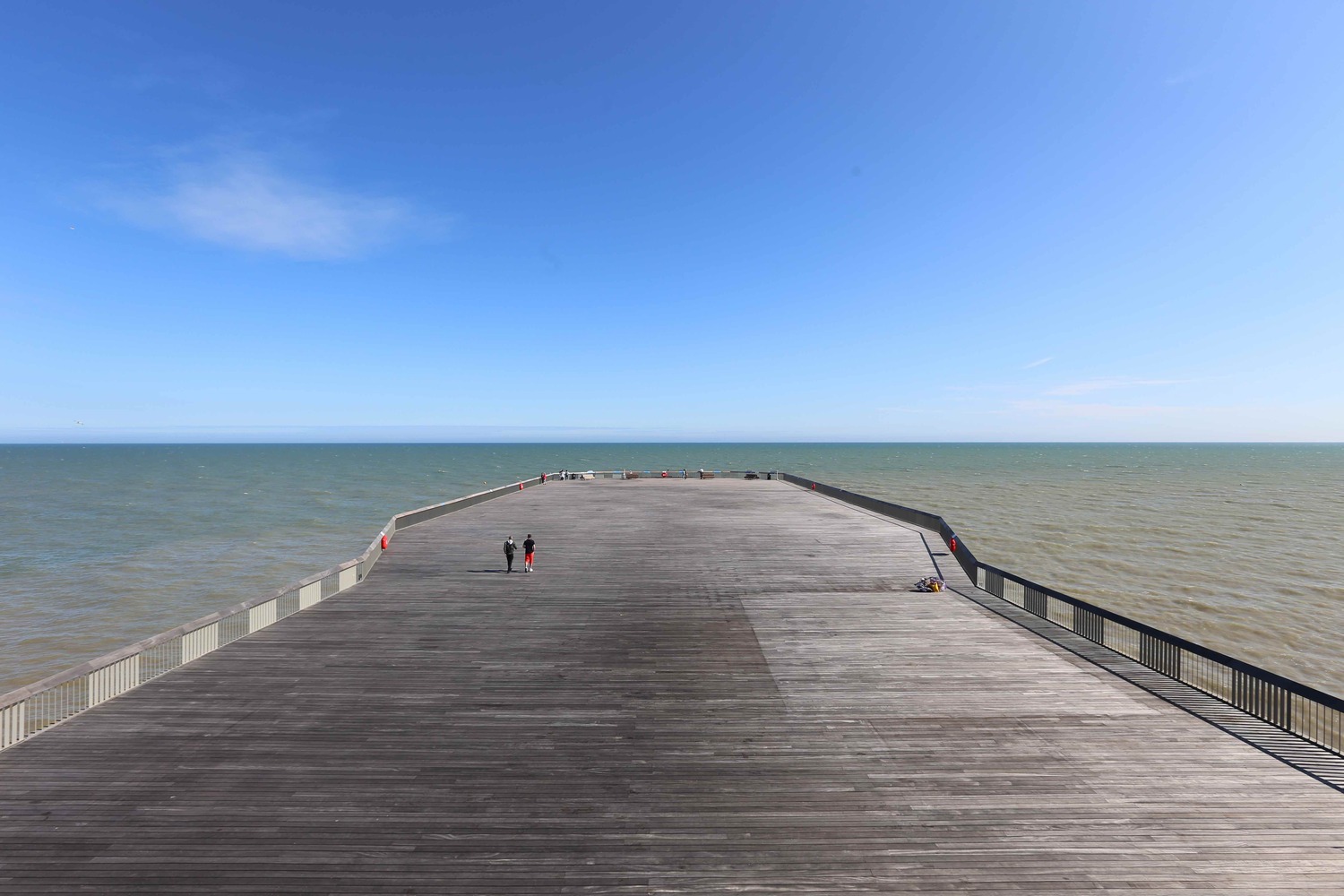 The blog post discusses how letting nature and minimal intervention influence architecture can lead to stunning designs, as seen in examples like Cedric Price’s work.